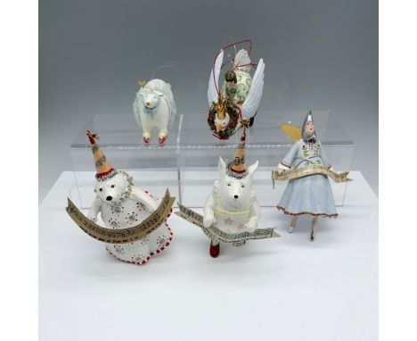 Darling collection of festive figures that includes a mermaid bear and a fox holding up lyrics to White Christmas, a moon fai