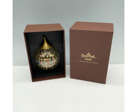 Lovely decorative item gilt with stars used to adorn your holiday tree. This item has its original box 4"L x 3.5"W x 6"H. Iss