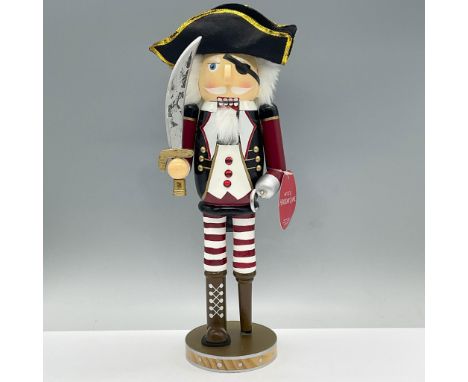 Ahoy Matey! This charming Pirate Nutcracker is equipped with a sword, a hook and peg leg. Tag reads, Macy's Holliday Lane. Di