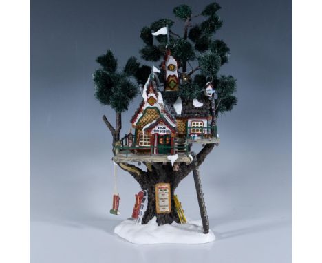 This light up treetop house is the meeting hall for Elves. Finely detail hand painted resin. This item has its original box t