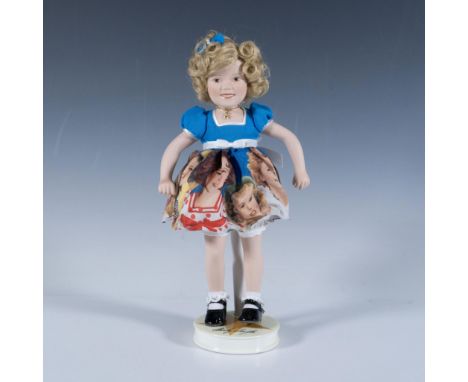 Styled with her famous curly blonde hair, bright smile and styled with a dress reflecting many of her movie roles. Round base