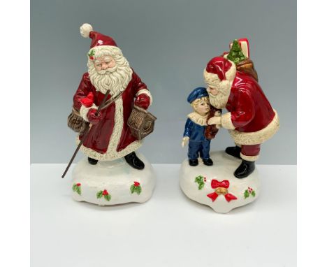 Beautiful duo of Noels that includes Santa with gifts and plays the song Jolly Old Saint Nick, and a Santa with a staff that 