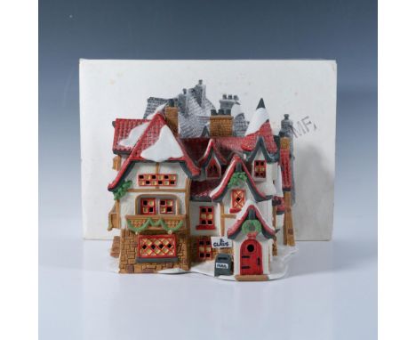 Santa's workshop porcelain figurine #56600-0. This item has its original box that measures 11.75"L x 8.5"W x 7.75"H. Departme