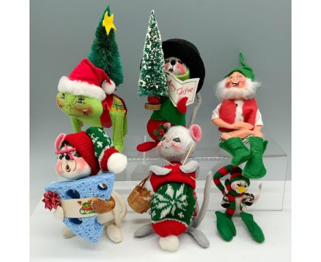 Splendid variety collection of holiday figures that includes a turtle with a tree on its back, a Christmas Caroling mouse, a 