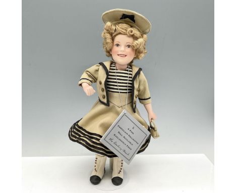 A nod to Shirley Temple's movie classics with this hand painted and dressed in hand sewn outfits related to that movie. Style