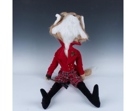 Magnificent figure of a fox modeling a velvet red jacket with a holly corsage and plaid red pants while holding an equestrian