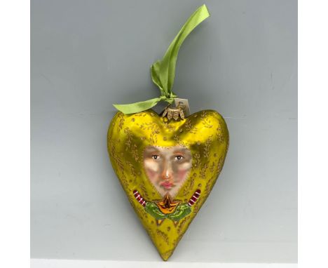 Stunning collectable that depicts a heart with striped sleeves holding a star. Patience Brewster tag. This item has its origi