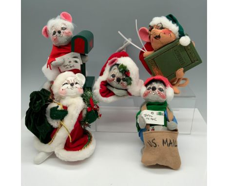 Adorable collection of holiday figurines that includes a mouse with letters next to a mailbox, a mouse with a US Mail postal 