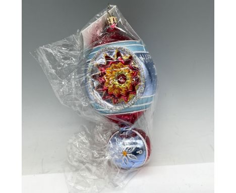Festive designed molded glass annual Holiday ornament colored in blue, red and white with Whitley Collection and year noted. 