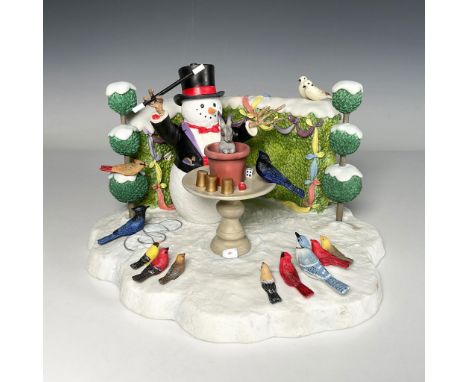 Hand painted resin of a Snowman Magician, with birds and a bunny. Incorporated lighting. Lenox backstamp on the underside. Th