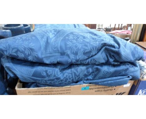 Two pairs of blue damask curtains