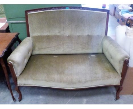 A late Victorian walnut salon sofa on cabriole legs. 50'' wide