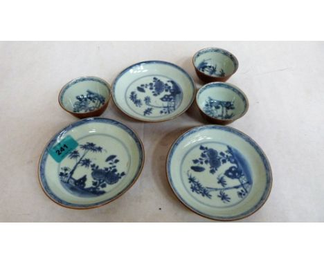 Three Chinese brown glazed and blue painted tea bowls and saucers