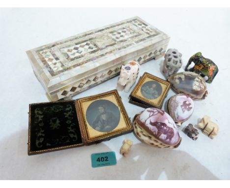 A mother-of-pearl box, hardstone and shell carvings, cased Ambrotypes and other objects