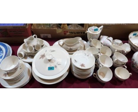 A Royal Doulton 'Tumbling Leaves' part tea and dinner service, 74 pieces and a 14 piece Minton 'Petunia' part coffee service