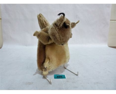 A Steiff squirrel glove puppet. Button in ear. One eye mssing