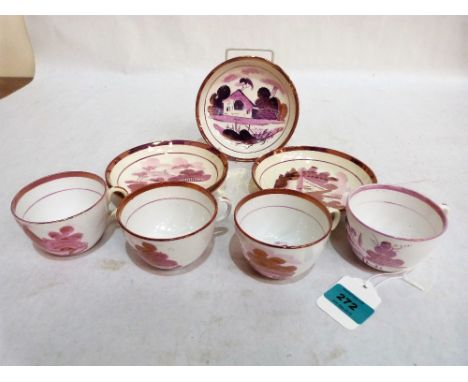 Four 19th century pink lustre decorated cups and saucers