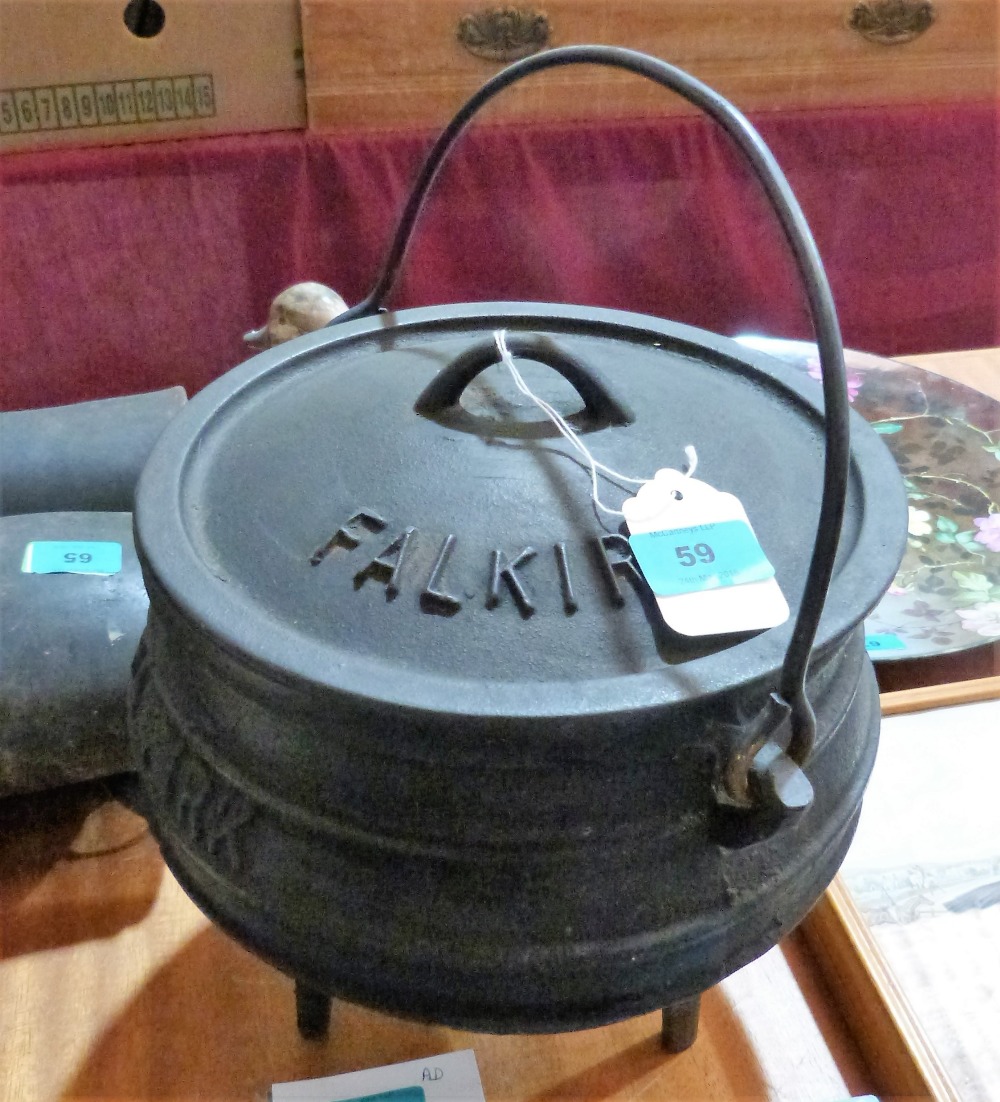 A cast iron 'Falkirk' cooking pot and cover
