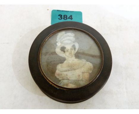 A late 18th century papier-mache snuffbox, the cover with portrait miniature. 3¼'' diameter. Closure lip lacking