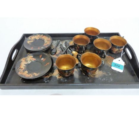 A Chinese papier-mache and lacquer tea service for six, the tray decorated with dragons
