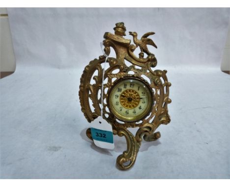 A 19th century French rococo revival gilt speltar mantle clock with drum movement (running). 8½'' high
