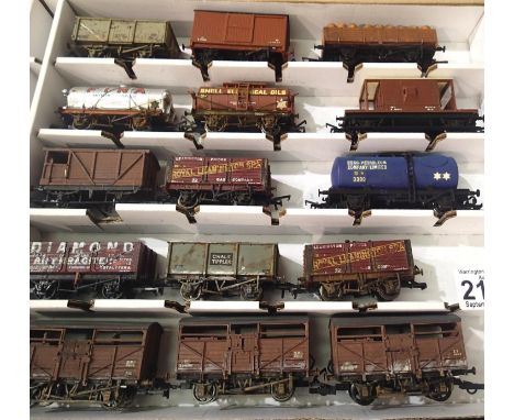 Fifteen OO scale wagons, various types and makes, mostly  weathered in Warley storage box. P&amp;P Group 2 (£18+VAT for the f