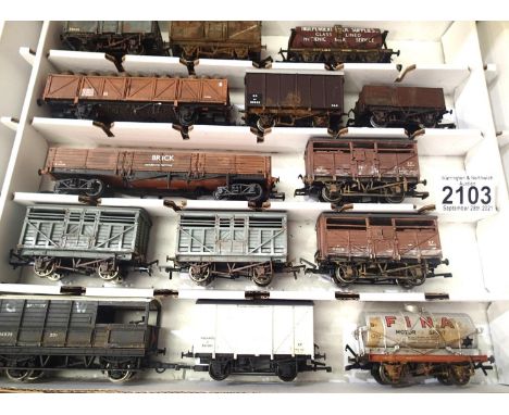 Fifteen OO scale wagons, various types and makes, mostly weathered in Warley storage box. P&amp;P Group 2 (£18+VAT for the fi
