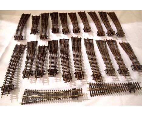 Twenty two OO scale Peco points, with fitted point motors, mostly in good - ex layout condition, weathered. P&amp;P Group 2 (