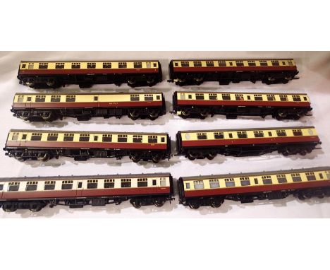 Eight Bachmann Crimson/Cream OO coaches, all fitted modified couplings (one coach faded), some fitted passengers, mostly in v