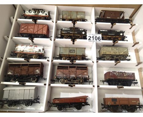 Fifteen OO scale wagons, various types and makes, mostly weathered in Warley storage box. P&amp;P Group 2 (£18+VAT for the fi