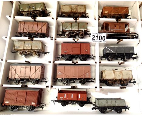Fifteen OO scale wagons, various types and makes, mostly weathered in Warley storage box. P&amp;P Group 2 (£18+VAT for the fi