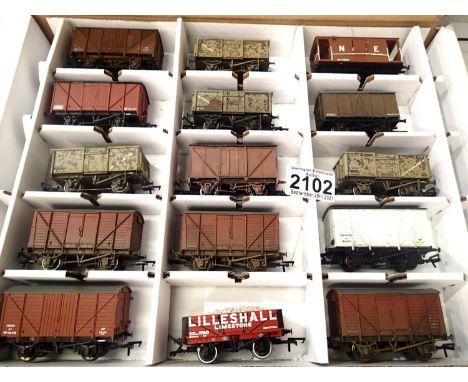 Fifteen OO scale wagons, various types and makes, mostly weathered in Warley storage box. P&amp;P Group 2 (£18+VAT for the fi