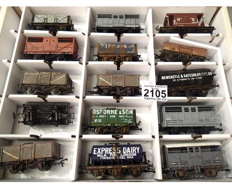 Fifteen OO scale wagons, various types and makes, mostly weathered in Warley storage box. P&amp;P Group 2 (£18+VAT for the fi