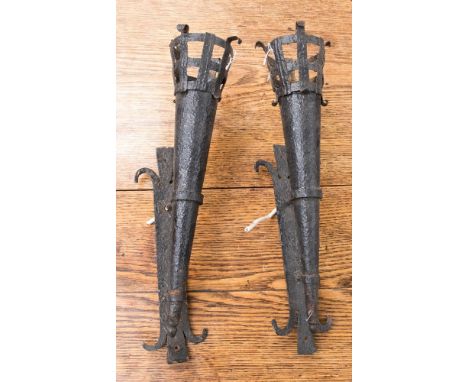 A pair of Medieval design light fittings, converted for electricity (2)
