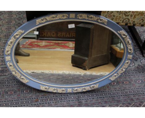 An oval mirror in Wedgwood jasper ware design, width 85cm