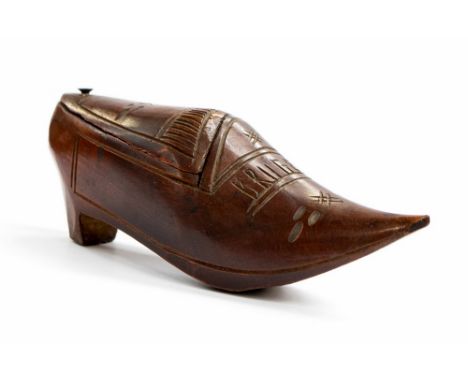 A late 19th Century snuff box in the form of a show, engraved 'Bruges' to the front