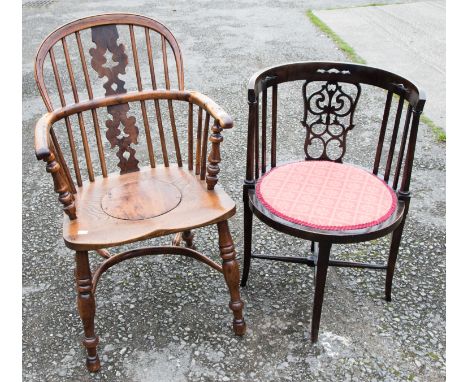 A 19th Century elm and yew wood Windsor armchair, the seat originally with a commode centre, together with an Edwardian tub c