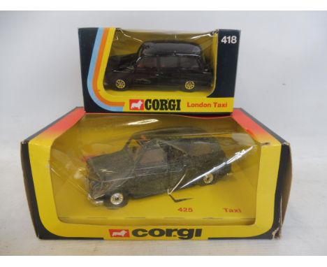 Two boxed Corgi Toys die-cast taxis. 