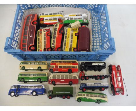 A collection of assorted scale die-cast models to include bus, tram, lorry, Corgi, EFE etc. 