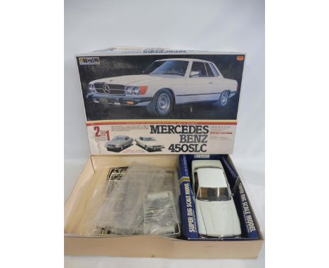 A boxed Doyusha 1:12 scale Mercedes Benz 450, contents appear to be part built and unchecked.