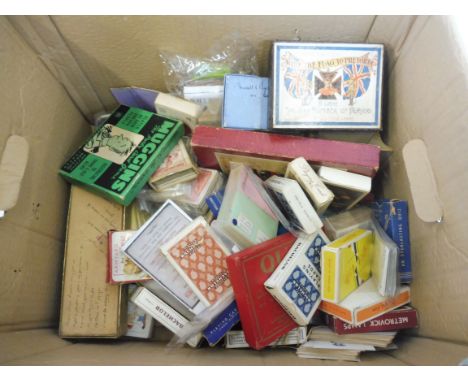 A quantity of playing cards and card games.