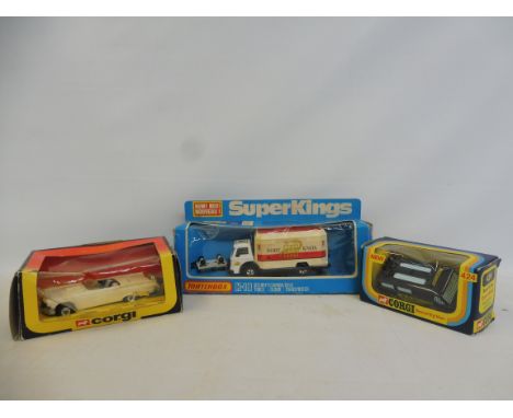 A boxed Matchbox Superking K-19 Security Truck, a boxed Corgi no. 424 Security Van and a Thunderbird, no. 801.