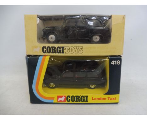 Two boxed Corgi Toys die-cast taxis. 