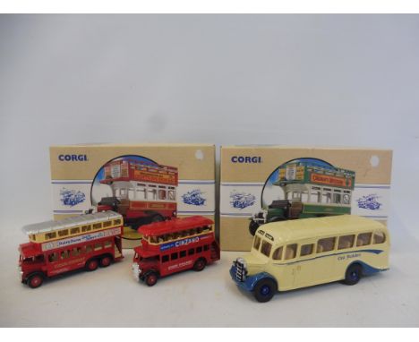 A small quantity of Corgi coaches, boxed and loose. 