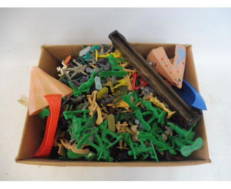 A group of 1:32 scale plastic soldiers. 