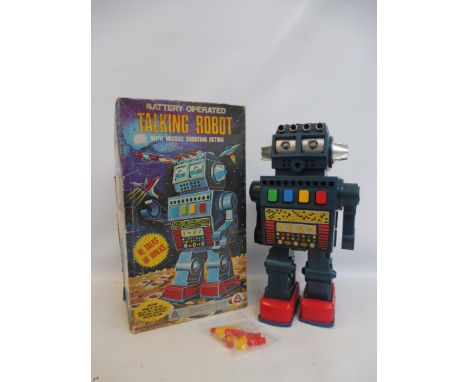 A boxed battery-operated talking robot, circa 1970s, made in Hong Kong. 