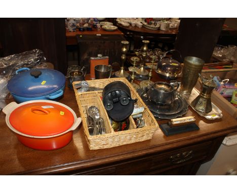 A blue Le Creuset twin handled dish and cover, a orange Le Creuset casserole dish and cover and a quantity of various metalwa