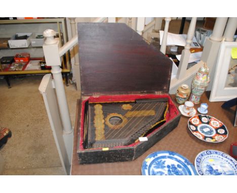 The Anglo American Zither Co. lion zither with fitted case