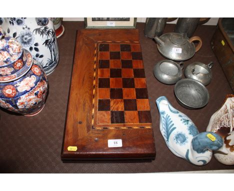 A 19th Century chess and backgammon board with chequer band inlay 