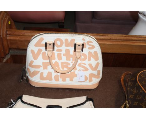 A Louis Vuitton X Steven Sprouse Graffiti Alma handbag 